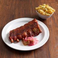 Baby Back Ribs Plate · Smoked and grilled, house BBQ and choice of side.