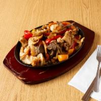 Fajitas · Includes rice and beans 