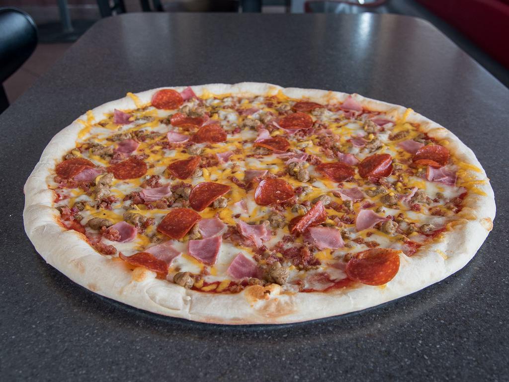 Meat Lover Slice Pizza · Covered with a blend of mozzarella, cheddar cheese, sausage, pepperoni, ham and bacon.
