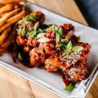 Wings with Fries · Choose from 6 flavors, including spicy Asian, honey ranch, sweet chili, lemon pepper and mor...
