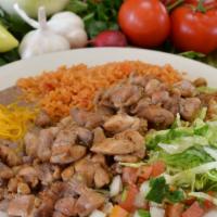 2. Pollo Asado Combo Platter · Grilled chicken, guacamole, lettuce and pico de gallo. Served with rice and beans.