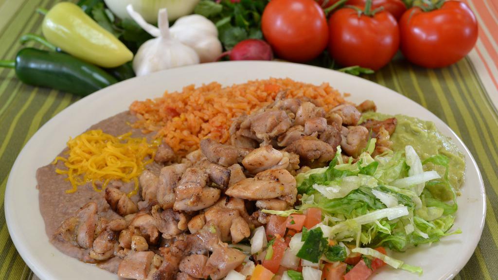 2. Pollo Asado Combo Platter · Grilled chicken, guacamole, lettuce and pico de gallo. Served with rice and beans.
