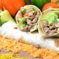 9. Carne Asada Burritos Combo Platter · 2 carne asada burritos made with carne asada, guacamole and pico de gallo served with rice a...