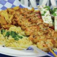 Shrimp Souvlaki Platter · Served with rice and Greek salad.