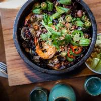 Black Rice · Mussels, shrimp, octopus, scallop, sausage, confit pork, lime leaf aioli and okra.