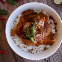 Chicken Curry · House Blend curry mix, fried chicken, potato and carrot pieces, and coconut-ginger-turmeric ...