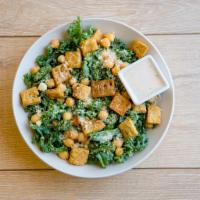 A Kale of Two Cities · Shredded kale, parmesan cheese, chickpeas, diced tomatoes, cauliflower croutons, vegan caesa...