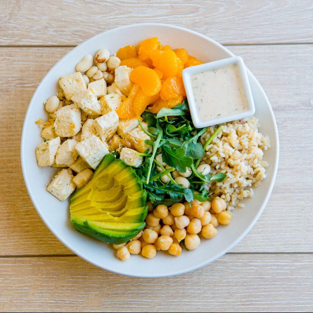 Avocado Namaste · Mixed greens, chickpeas, avocado, roasted salt-free peanuts, Mandarin oranges, creamy sesame dressing. Served with a base of your choice and either roasted antibiotic-free chicken or roasted sesame tofu. Gluten-free.