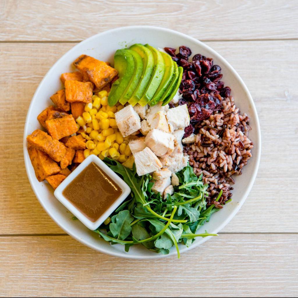 Thanksgiving Upgrade · Arugula, corn, roasted sweet potatoes, dried cranberries, avocado, balsamic vinaigrette dressing. Served with your choice of roasted antibiotic-free chicken or roasted sesame tofu. Gluten-free.