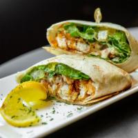 Chicken Caesar Wrap  · Grilled chicken, romaine lettuce, parmesan cheese, Caesar dressing, wrapped in a flour torti...