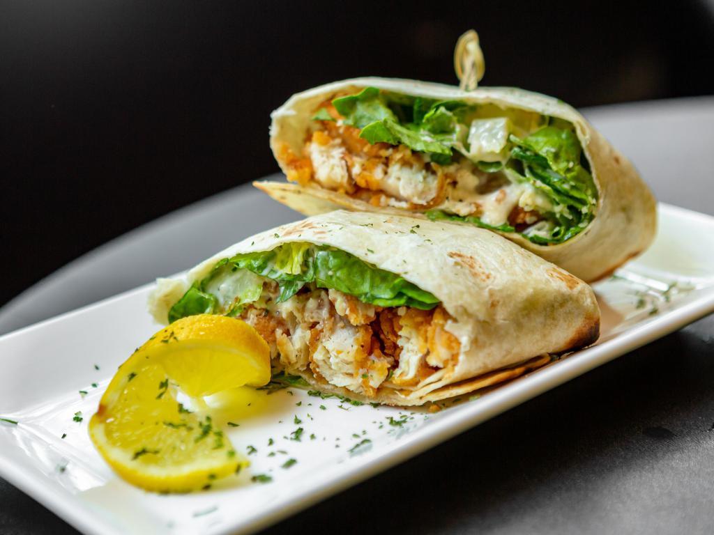Chicken Caesar Wrap  · Grilled chicken, romaine lettuce, parmesan cheese, Caesar dressing, wrapped in a flour tortilla.