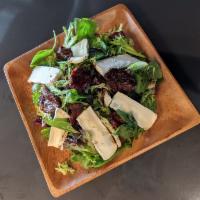 Jorge Luis Salad · Verdes de estacion con tomates confitados y queso brie. Season green leaves salad with brie ...