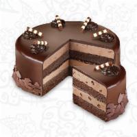 Midnight Delight Cake · Layers of moist devil's food cake, fudge and chocolate ice cream with chocolate shavings wra...
