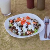 Burrito Bowl · Choose you meat! Ground beef, steak, al pastor, chicken and chorizo! Lettuce, cheese, beans,...