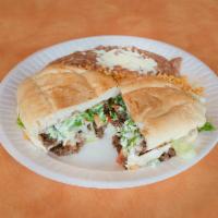 Torta Dinner · Choice of filling. Served with rice and beans, cheese and sour cream. Includes beans, lettuc...