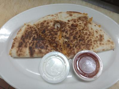Cheese Quesadilla · Just cheese with sour cream and salsa on the side