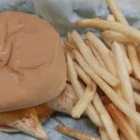 Grilled Chicken Sandwich with fries · Boneless skinless chicken sandwich.