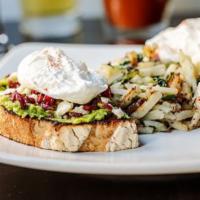 Avocado Toast · two poached eggs, sourdough, avocado, feta, dried
cranberries, served with quinoa hash 