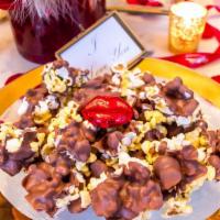Caramel Corn Nut Crunch – Dark Chocolate · Freshly popped popcorn, drenched in our own secret caramel syrup recipe, and rich peterbrook...