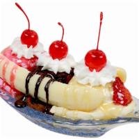 Banana Split · 3  scoops of ice cream vanilla, chocolate, and strawberry. Strawberry topping, pineapple top...
