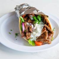  Gyros Sandwich · Beef and lamb meat on a pita bread topped with lettuce, tomatoes, red onion, and tzatziki sa...