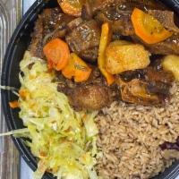 Jenny's Oxtail Stew dinner · Oxtail seasoned with Caribbean herbs & spices and stewed in a savory brown gravy with carrot...