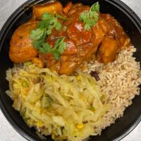 Stew Chicken · Chicken seasoned with Caribbean spices and stewed in a sweet brown gravy with carrots and po...