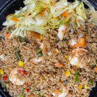 Shrimp Fried Rice · Rice fried with mixed vegetables,  Shrimp ,Chinese seasonings and Caribbean herbs and spices. 