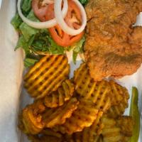 Q-Famous Chicken Sandwich  · Chicken breast breaded in house,  topped with lettuce, tomato, onion. Served with fries and ...