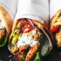 Chicken Gyro Sandwich with Fries · Lettuce, Tomatoes, Onions, Gyro Sauce