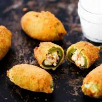 Jalapeno Poppers  · 6 pieces of Jalapeno poppers .