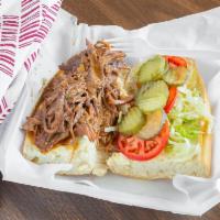 Roast Beef Sandwich · Slow-cooked sirloin roast on French bread dressed in gravy, mayo, lettuce, tomato and pickles.