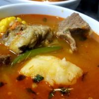 Caldo de Res · Beef soup with carrots, potatoes, cabbage and corn. Serve with side of rice onion, cilantro,...