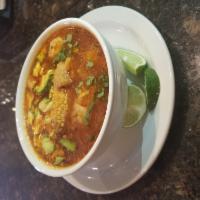 Caldo de Pata de Res · Cow's feet and tripe soup with cabbage. Serve with side of rice onion, cilantro, lime and to...