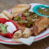 Appetizer Platter  · A sampler of chicken taquitos, garlic-mashed potato tacos, nachos and cheese quesadilla serv...