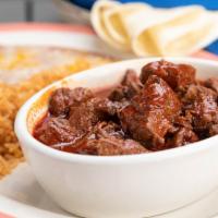 Chile Colorado Plate · Tender and juicy chunks of beef, slow simmered in a Mexican style chile (red) sauce served w...