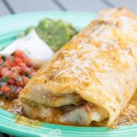 Chile Verde Burrito · Marinated Pork with onion and tomatillo salsa served with refried beans and Mexican rice and...