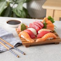 Sushi and Sashimi Combo · 3x Tuna sashimi, 3x salmon sashimi, 2x tuna sushi, 2x salmon sushi,  1x shrimp sushi, 1x til...