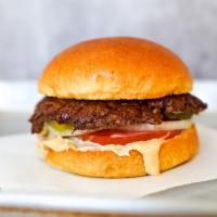 Smash Shack Smash Burger · Juicy, grilled beef burger smashed to perfection with fresh shredded lettuce, sliced tomato,...