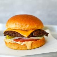 Smash Shack Cheeseburger · Juicy, grilled beef burger smashed to perfection with American cheese, fresh shredded lettuc...