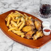 Wings · Lemon pepper, BBQ, hot, hennessey or mild wings served with a portion of french fries