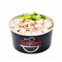 7. Dynamite Bop · Shrimp, crabmeat, scallop, corn, and red onion, (pre-marinated) above lettuce and rice. Defa...