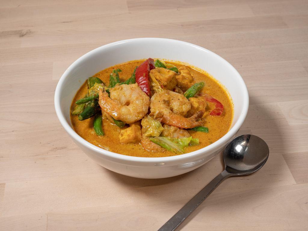Shrimp Curry Soup · Shrimp, dry tofu, cabbage, red bell pepper, tomato, and string beans simmered in a stew of coconut milk, evaporated milk, curry and house spice blend.