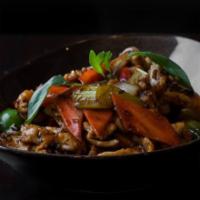 Black Pepper Chicken · Marinated chicken with onions, red and green bell peppers, celery, carrots, garlic, white wi...