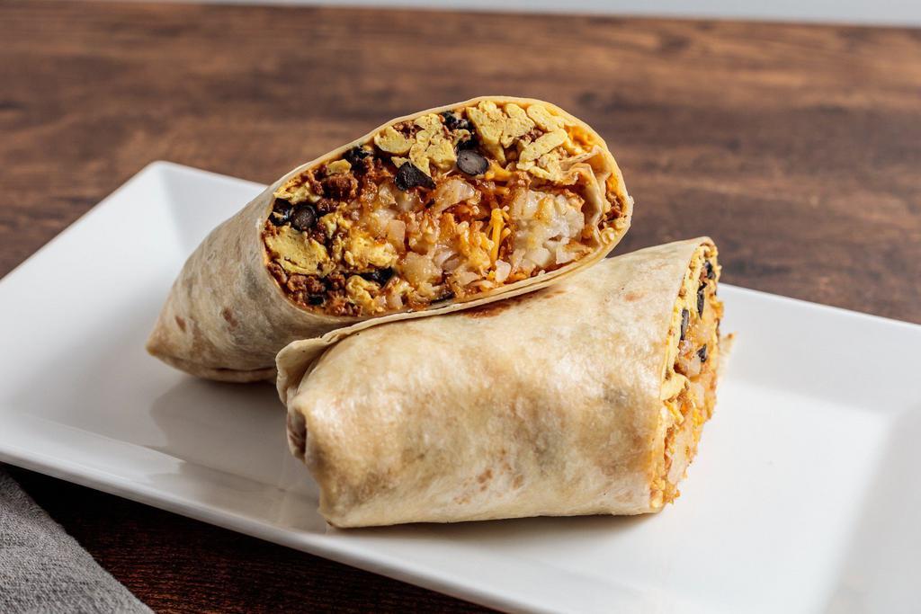 POPS’ Special · Eggs, chipotle cream cheese, chorizo, black beans, crispy tater tots and melted shredded cheese rolled in a flour tortilla wrap. Served with hot sauce.