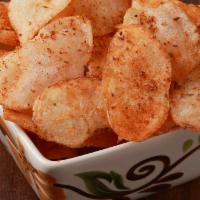 Potato Chips · Made fresh when ordered.  Get them salted or a touch of spice with cajun seasoning.  