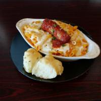 Baked Ziti · Penne pasta blended with ricotta. Topped with mozzarella and baked.
