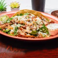 Fajitas Taco Salad · Chicken or steak. Salad comes with lettuce, cheese, pico de gallo, taco shell with beans und...
