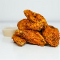 Classic Bone-In Wings · Classic bone-in chicken wings fried golden brown and crispy. Served with your choice of dipp...