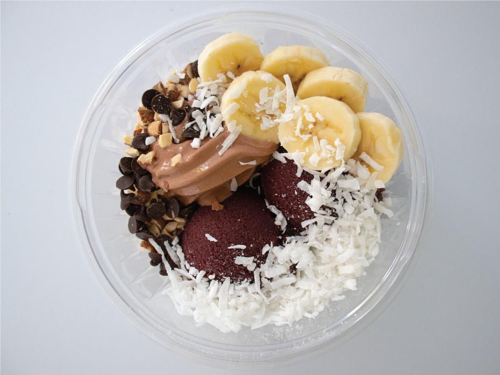 Cacao Bowl · You’ll love this bowl a choco-lot! It’s made with organic acai, chocolate frozen yogurt, almonds, bananas, carob chips, and coconut shreds.